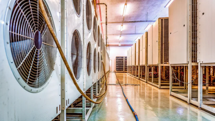 Industrial cooling system with large air conditioning units in a data center facility
